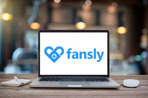 A laptop screen with Fansly logo on it.