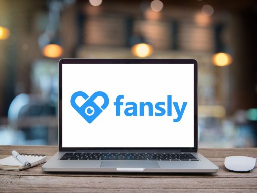 A laptop screen with Fansly logo on it.